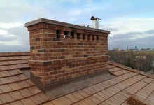 Chimney instalation in flat Wieneberger roof tiles